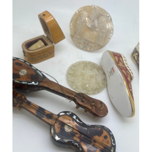 1287 - A miscellany to include Spode shoes, tortoiseshell guitar and mandolin, mother of pearl Bethlehem pl... 