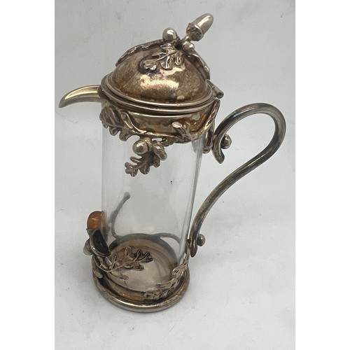 763 - Dutch white metal coaster maker VK, .925 and glass jug decorated with acorns and amber and two horn ... 