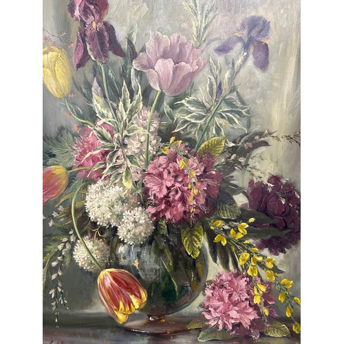 1397 - Thomas G. Hill (British 20thC) oil on canvas, a framed still life of flowers. Image size 60 x 50cm.