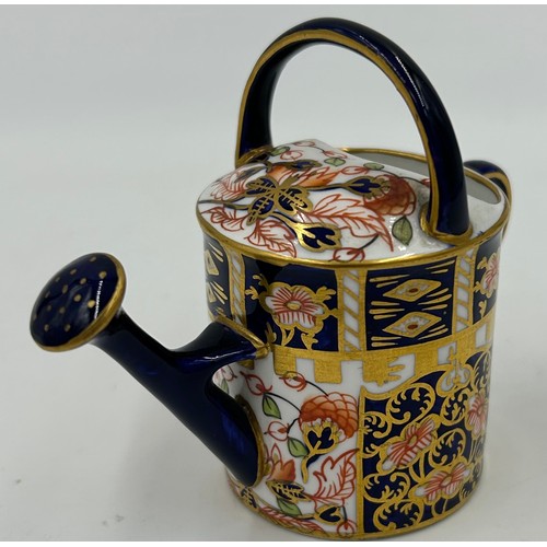 388 - Royal Crown Derby: an 1128 Old Imari Gadroon Edge plate 23cm diameter and a miniature watering can 8... 