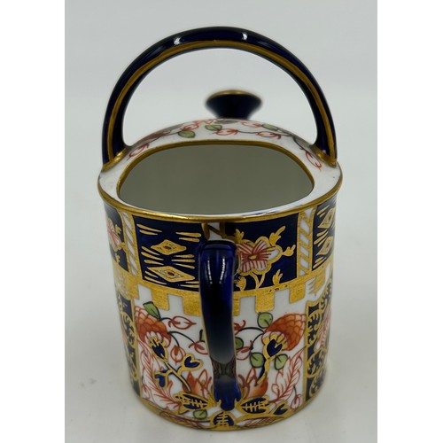 388 - Royal Crown Derby: an 1128 Old Imari Gadroon Edge plate 23cm diameter and a miniature watering can 8... 