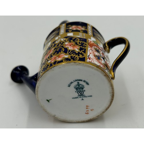 388 - Royal Crown Derby: an 1128 Old Imari Gadroon Edge plate 23cm diameter and a miniature watering can 8... 