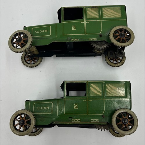 1151 - Two Lehmann No.765 Sedans, tinplate and clockwork models finished in green and cream with single fix... 