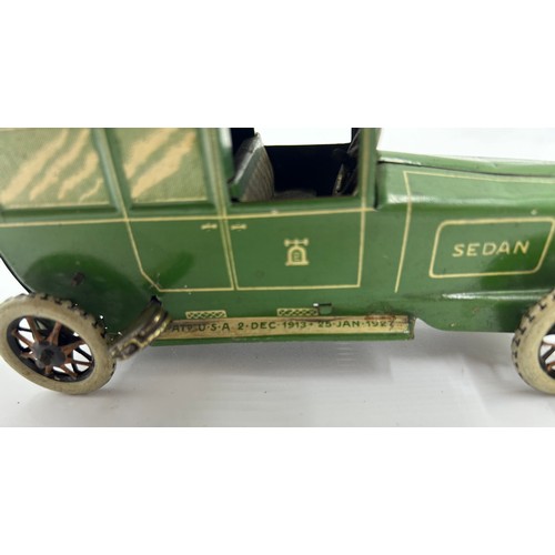 1151 - Two Lehmann No.765 Sedans, tinplate and clockwork models finished in green and cream with single fix... 