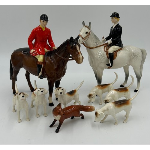 220 - Beswick - A Hunting set consisting of Huntsman model no. 1501, Huntswoman model no. 1730, six huntin... 