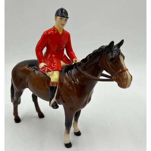 220 - Beswick - A Hunting set consisting of Huntsman model no. 1501, Huntswoman model no. 1730, six huntin... 