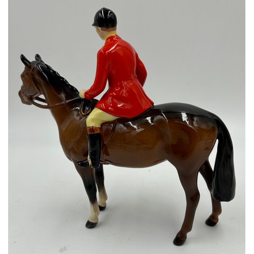 220 - Beswick - A Hunting set consisting of Huntsman model no. 1501, Huntswoman model no. 1730, six huntin... 