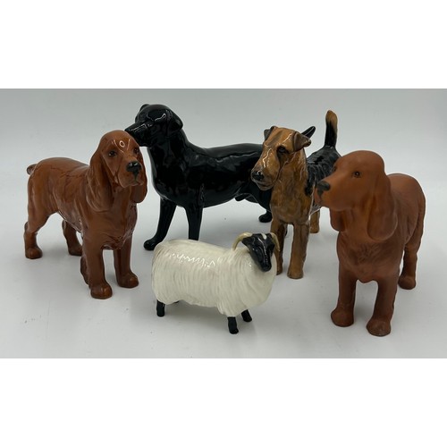 222 - Beswick - a black Labrador, a Spaniel 'CH Horseshoe Primula' 13cm h, and a matt Spaniel, a Black fac... 