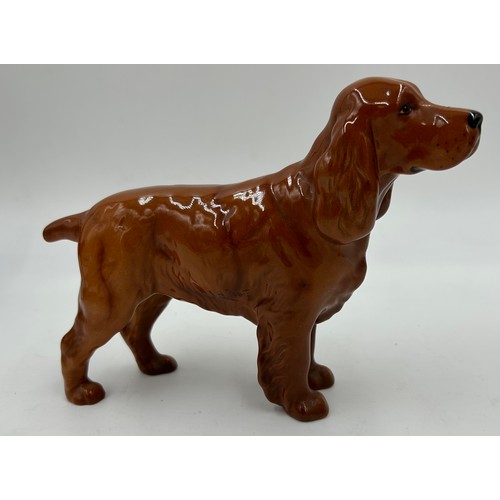 222 - Beswick - a black Labrador, a Spaniel 'CH Horseshoe Primula' 13cm h, and a matt Spaniel, a Black fac... 