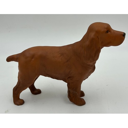 222 - Beswick - a black Labrador, a Spaniel 'CH Horseshoe Primula' 13cm h, and a matt Spaniel, a Black fac... 