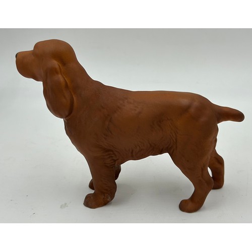 222 - Beswick - a black Labrador, a Spaniel 'CH Horseshoe Primula' 13cm h, and a matt Spaniel, a Black fac... 