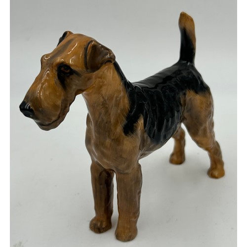 222 - Beswick - a black Labrador, a Spaniel 'CH Horseshoe Primula' 13cm h, and a matt Spaniel, a Black fac... 