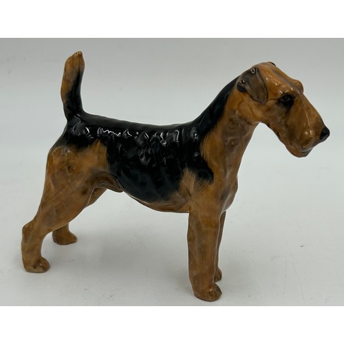 222 - Beswick - a black Labrador, a Spaniel 'CH Horseshoe Primula' 13cm h, and a matt Spaniel, a Black fac... 