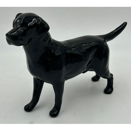 222 - Beswick - a black Labrador, a Spaniel 'CH Horseshoe Primula' 13cm h, and a matt Spaniel, a Black fac... 