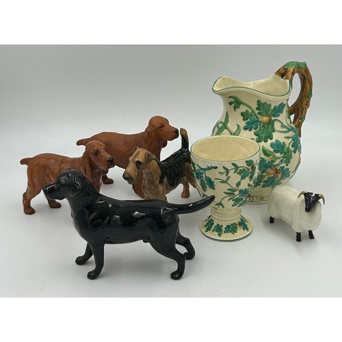 222 - Beswick - a black Labrador, a Spaniel 'CH Horseshoe Primula' 13cm h, and a matt Spaniel, a Black fac... 