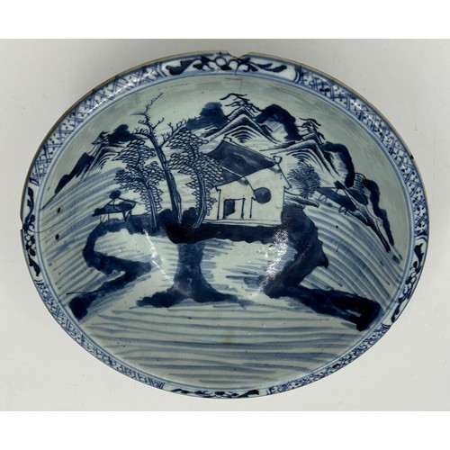 938 - An 18thC Chinese porcelain bowl, 28cm diameter x 11cm h. a/f.