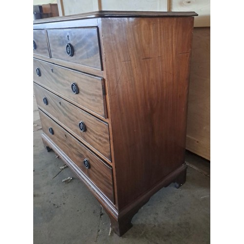 62 - A 19thC mahogany chest of two short over three long drawers on bracket feet with brass circular hand... 