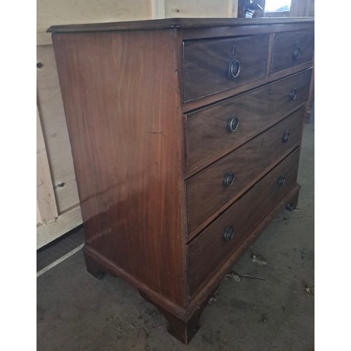 62 - A 19thC mahogany chest of two short over three long drawers on bracket feet with brass circular hand... 