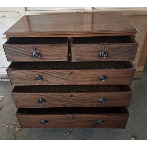 62 - A 19thC mahogany chest of two short over three long drawers on bracket feet with brass circular hand... 