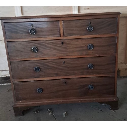 62 - A 19thC mahogany chest of two short over three long drawers on bracket feet with brass circular hand... 