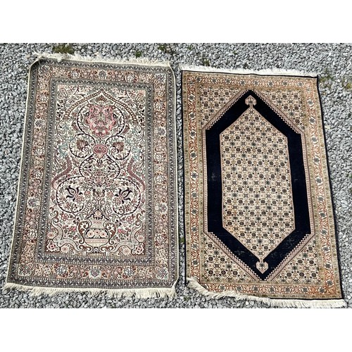 1220 - Two Kashmir silk rugs. Both approx. 160 x 92cm.