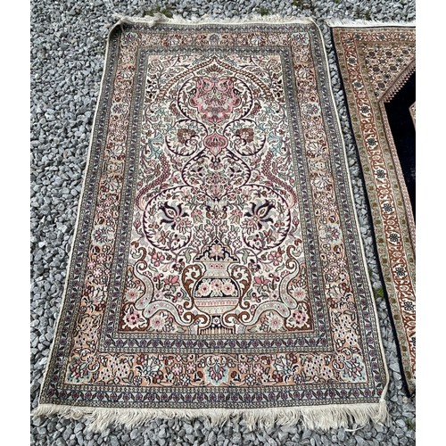 1220 - Two Kashmir silk rugs. Both approx. 160 x 92cm.