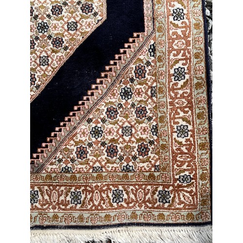 1220 - Two Kashmir silk rugs. Both approx. 160 x 92cm.