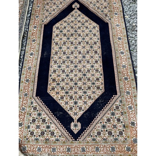 1220 - Two Kashmir silk rugs. Both approx. 160 x 92cm.