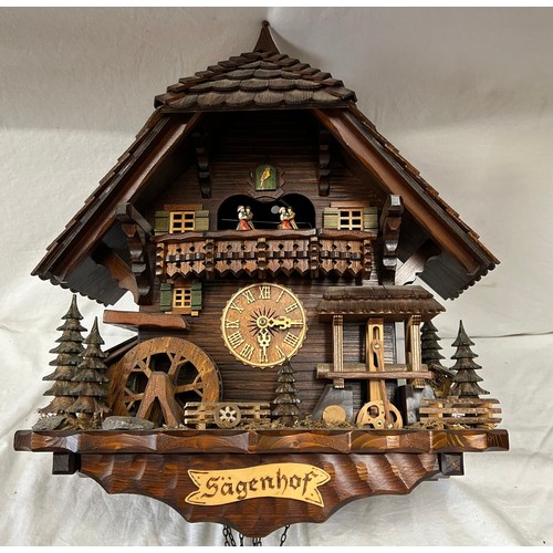 1009 - A large cuckoo clock, made in Germany, marked Sägenhof with a Regula movement, Pendell 28.5cm and th... 