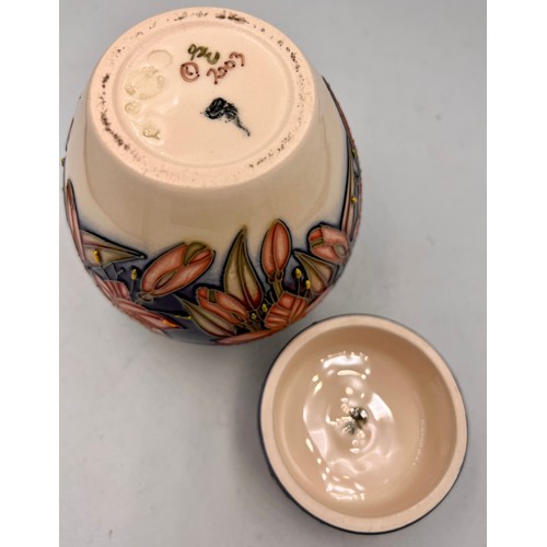 211 - A Moorcroft Peruvian Lily pattern ginger jar. 11cm h. In original box.