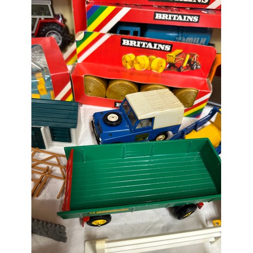 1191 - Britains diecast farming models to include 9556 Hay Baler, 9535 Potato Harvester, 9581 Unimog Breakd... 