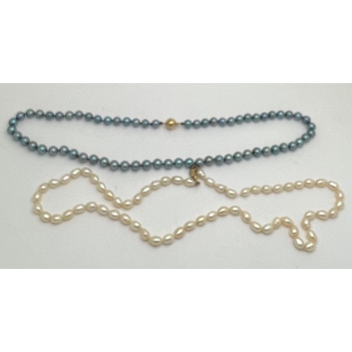 627 - Two cultured pearl single strand necklaces, both with 9 carat gold clasps. Length 46cm and 49cm.