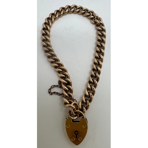 628 - A 9 carat gold chain bracelet with padlock fastening and safety chain. Marked to each link. Weight 2... 