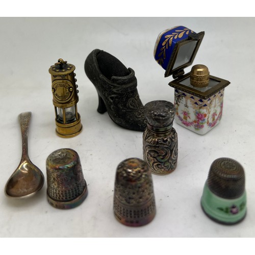 1295 - A miscellaneous lot to include silver scent bottle 3cm h, Birmingham 1891, maker CC May & Sons. Porc... 