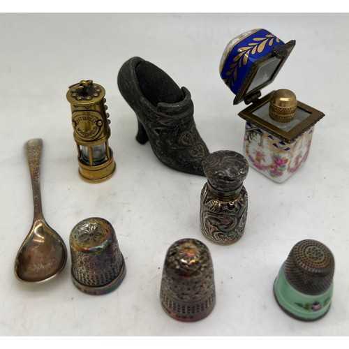 1295 - A miscellaneous lot to include silver scent bottle 3cm h, Birmingham 1891, maker CC May & Sons. Porc... 