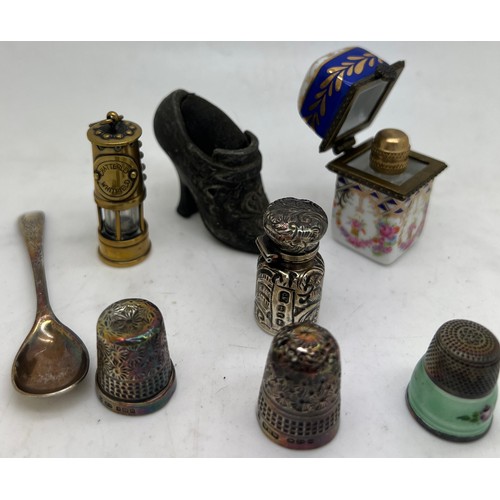 1295 - A miscellaneous lot to include silver scent bottle 3cm h, Birmingham 1891, maker CC May & Sons. Porc... 