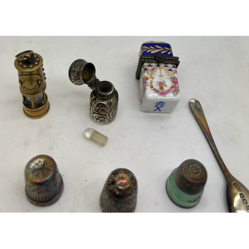 1295 - A miscellaneous lot to include silver scent bottle 3cm h, Birmingham 1891, maker CC May & Sons. Porc... 