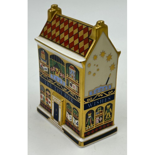 400 - A collection of Royal Crown Derby Cottages to include 'The Christmas Box' 'The China Shop' signed to... 