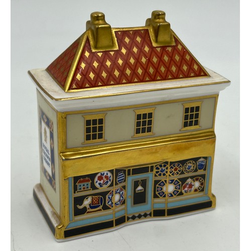 400 - A collection of Royal Crown Derby Cottages to include 'The Christmas Box' 'The China Shop' signed to... 