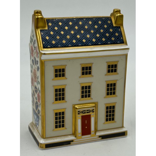 400 - A collection of Royal Crown Derby Cottages to include 'The Christmas Box' 'The China Shop' signed to... 