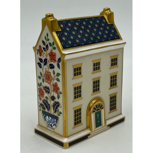 400 - A collection of Royal Crown Derby Cottages to include 'The Christmas Box' 'The China Shop' signed to... 