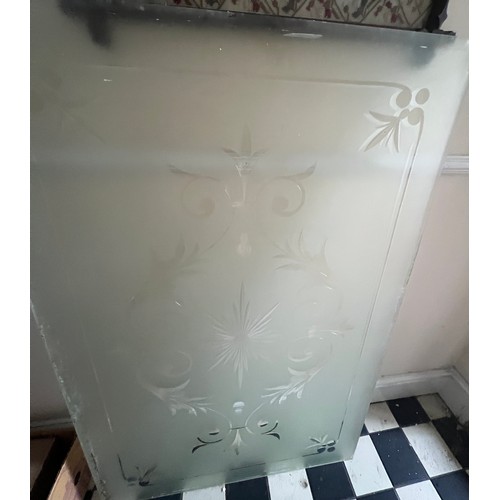 23 - A Victorian etched glass panel originally in a butcher’s shop. 138cm x 89cm.