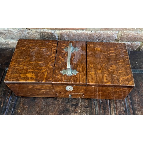 948 - An oak cigarette/cigar box with mother of pearl escutcheon and drawer to front. 35cm x 15cm x 10cm h... 