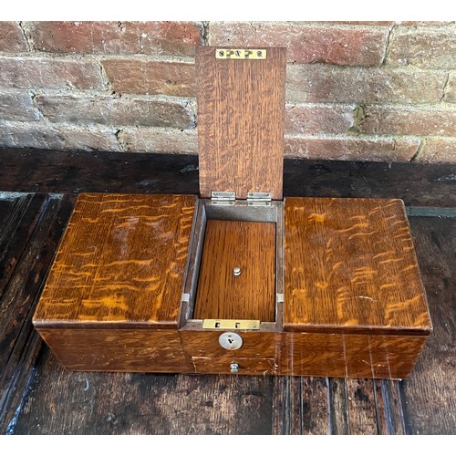 948 - An oak cigarette/cigar box with mother of pearl escutcheon and drawer to front. 35cm x 15cm x 10cm h... 