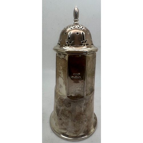 780 - A silver sugar sifter. Birmingham 1925, maker Wilmot Manufacturing  Co. Weight 152gm. 15.5cm h.