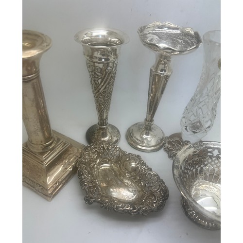 771 - Silver to include three weighted vases, candlestick with weighted base 13cm h. and two dishes. Vario... 