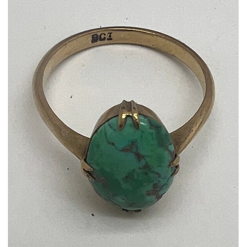 648 - Nine carat gold ring set with oval turquoise. Size O. Weight 2.4gm.