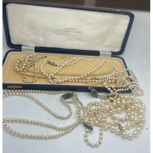 657 - A collection of mainly cultured pearl necklaces, most with silver clasps. (Six necklaces and one bra... 