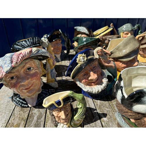 196 - A collection of twenty Royal Doulton Toby Jugs to include: D5823 Auld Mac, D6438 Rip Van Winkle, D65... 