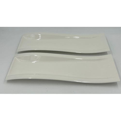 200 - Villeroy and Boch part dinner service in the 'New Wave' pattern to include: a large bowl 34cm d, 2 x... 